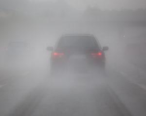 nissan driving through mist